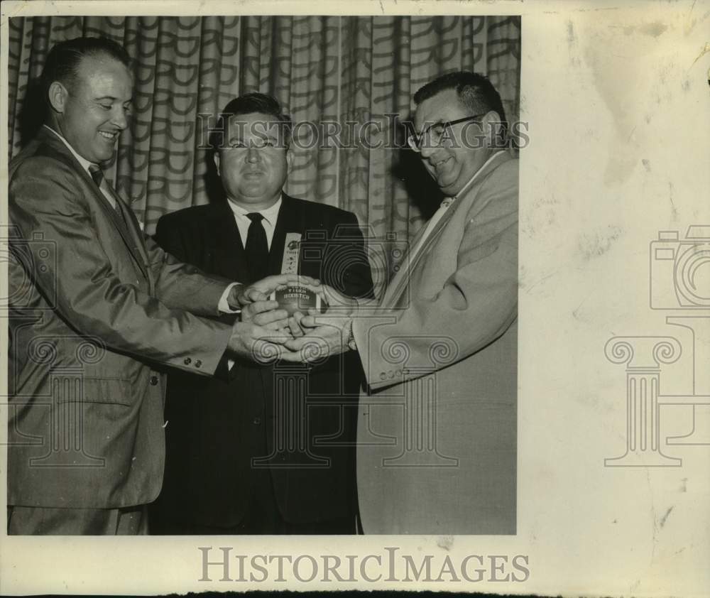 1957 Press Photo Men Receive Football Award - sas22545 - Historic Images