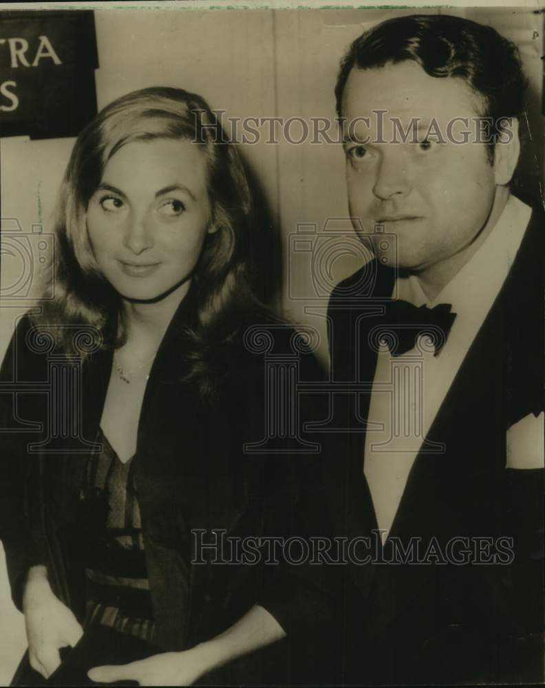 1955 American Actor Orson Welles is shown with Paoula Mori, Actress - Historic Images