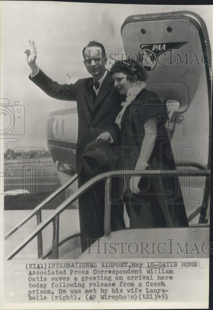 1953 Press Photo Reporter William Oatis Reunites With Wife at New York Airport- Historic Images