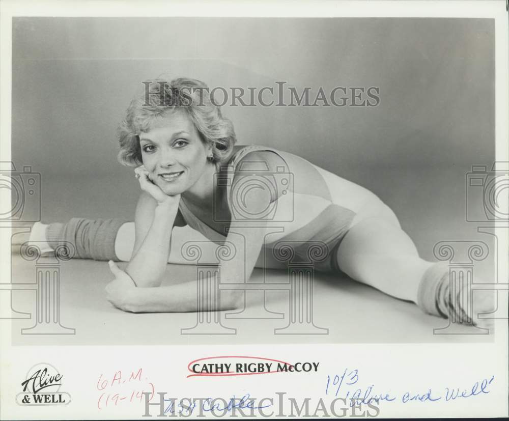 Press Photo &quot;Alive &amp; Well&quot; Host Cathy Rigby McCoy Stretches in Workout Gear - Historic Images