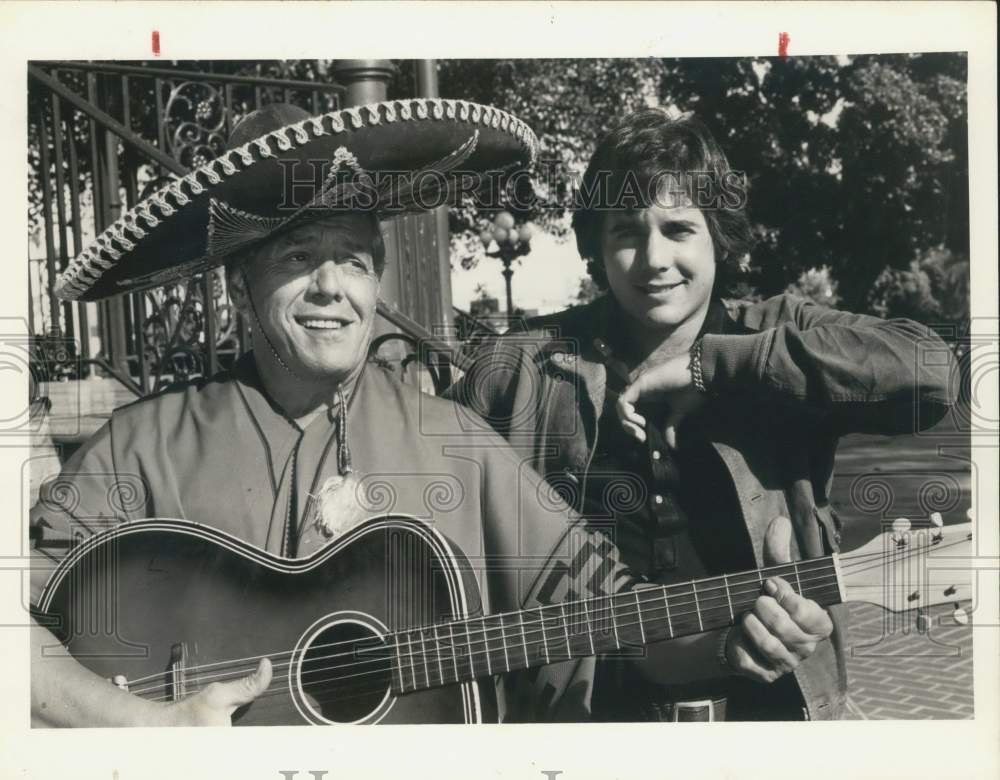 1974 Press Photo Desi Arnaz, Sr. with his son Desi Arnaz, Jr. - Historic Images