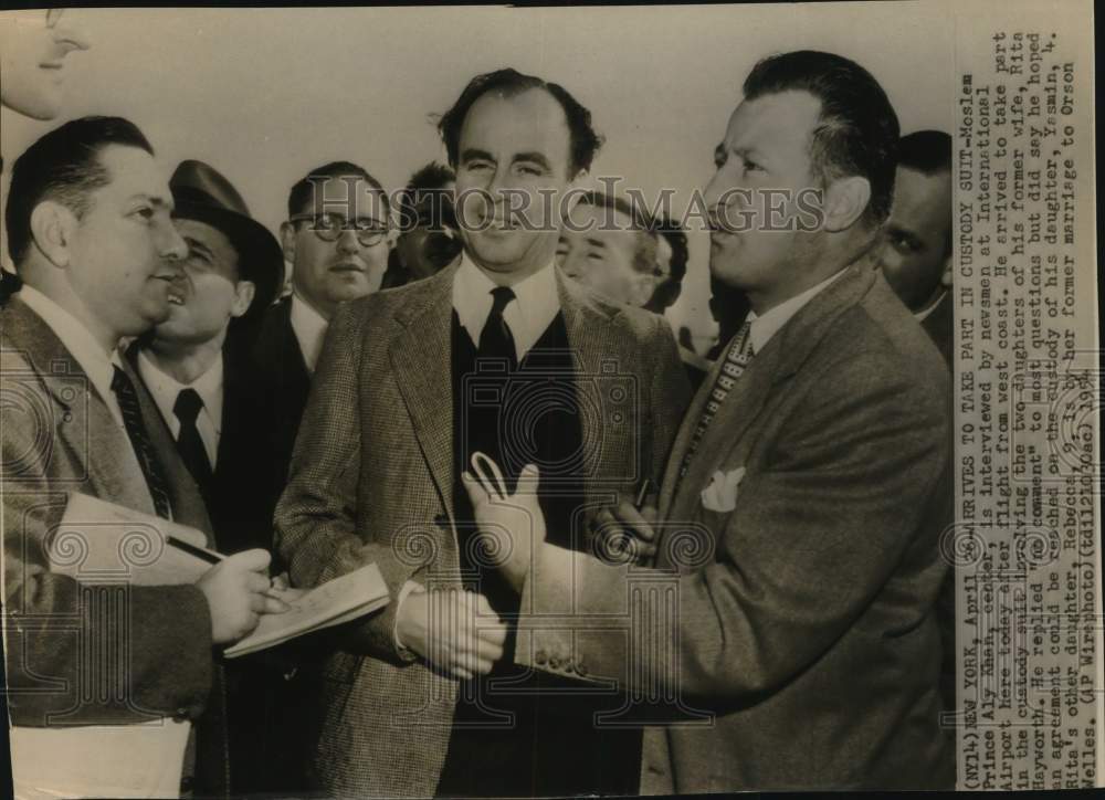 1954 Prince Aly Khan talks with newsmen about custody suit, New York-Historic Images
