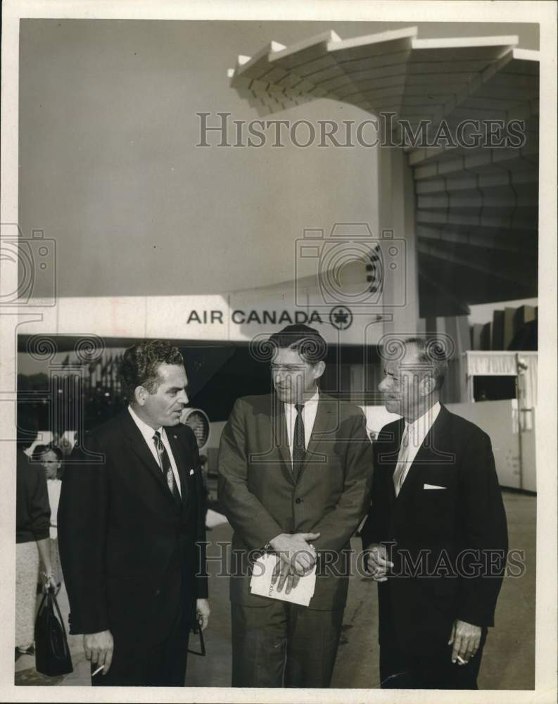 1966 Press Photo Hemisfair '68 officials confer under Air Canada pavilion.- Historic Images