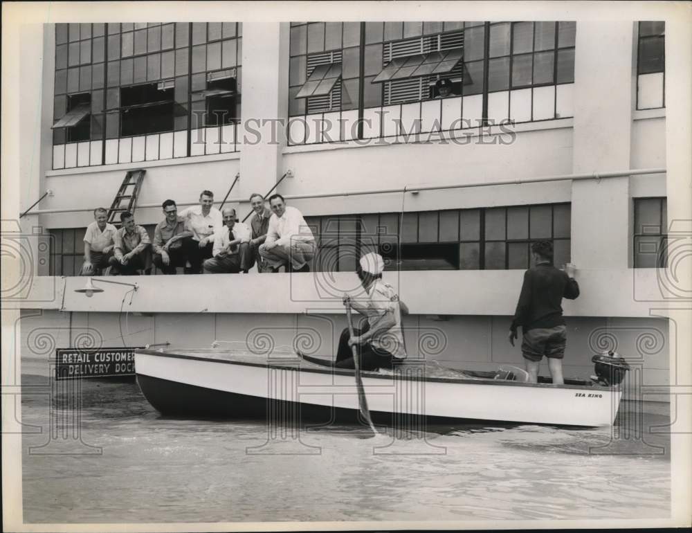 Press Photo Wooden boat used to rescue those stranded from flood - sax26651- Historic Images