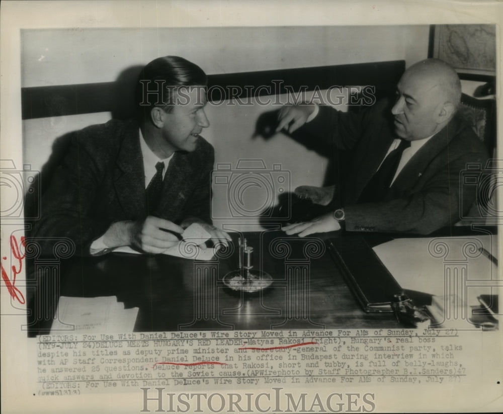 1947 Matyas Rakosi of Hungary talks with Daniel DeLuce of AP - Historic Images