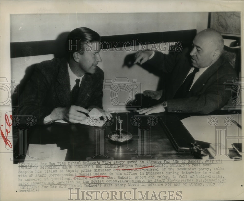 1947 Matyas Rakosi of Hungary talks with Daniel DeLuce of AP - Historic Images