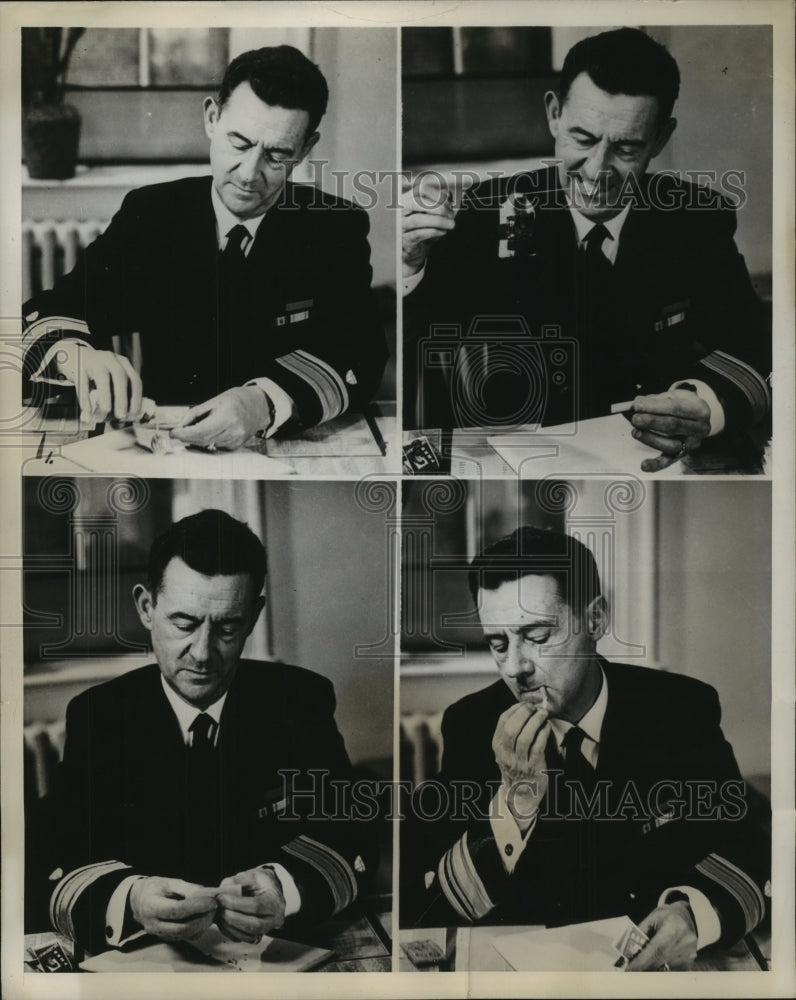 1944 Rear Admiral James Pine shows how to roll own tobacco cigarette - Historic Images