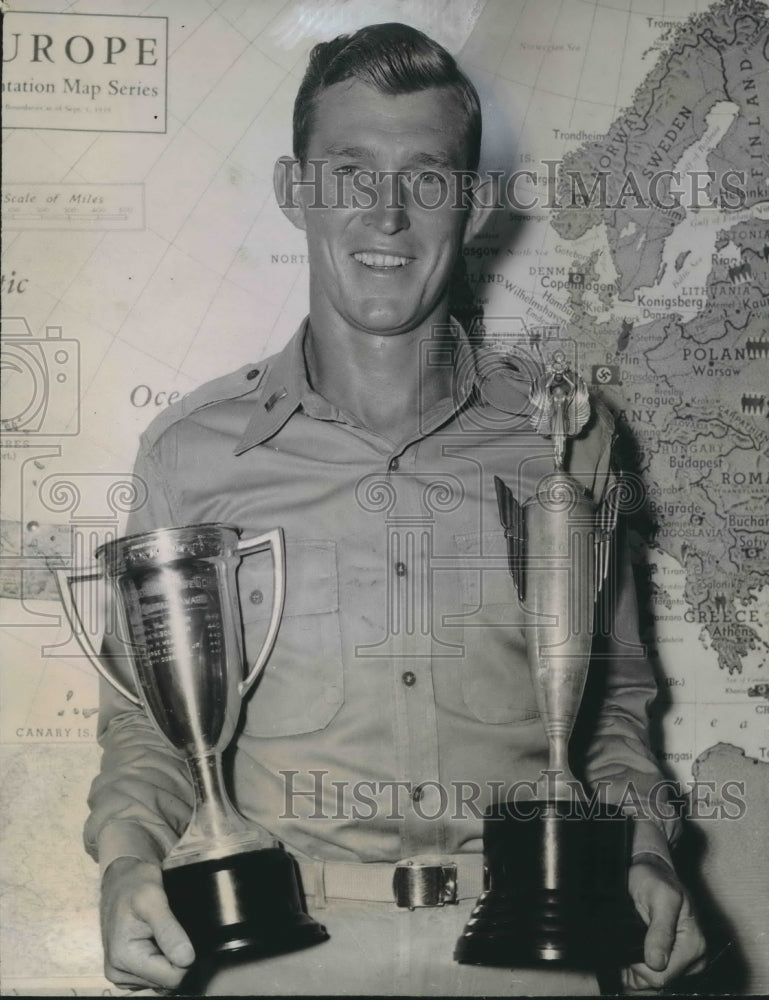 Press Photo Glenn Dolk holds two trophies - sba09030-Historic Images