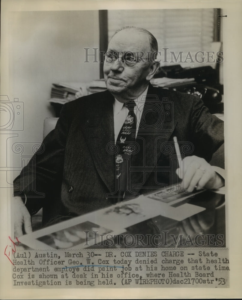 1953 Press Photo State Health Officer Dr George W Cox in Austin Texas office - Historic Images