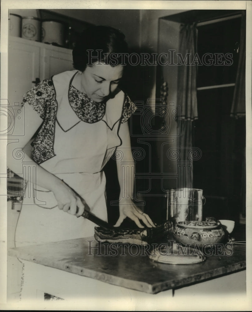 Press Photo Mrs McCraw slices the bacon - sba11349-Historic Images