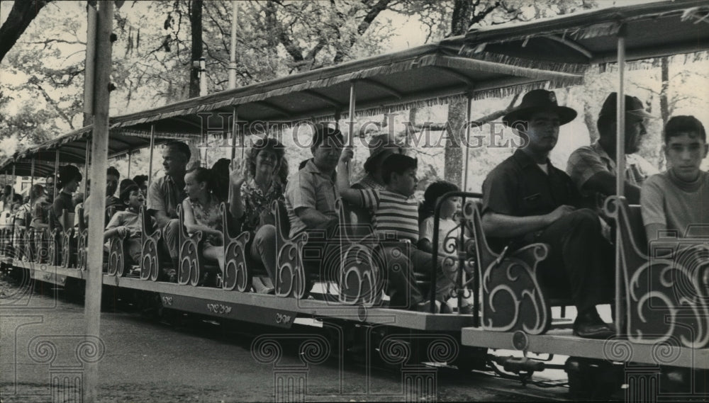 Park ranger Jerry Cantu rides the Brackenridge Eagle-Historic Images