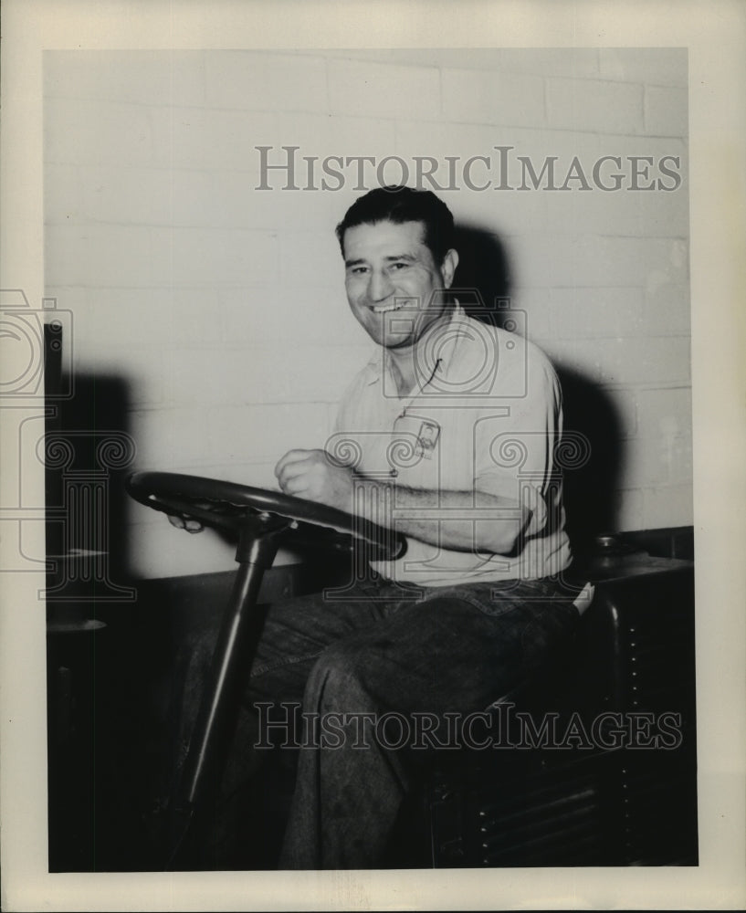 A smiling image of Alfonso (Kid Pancho) Flores - Historic Images