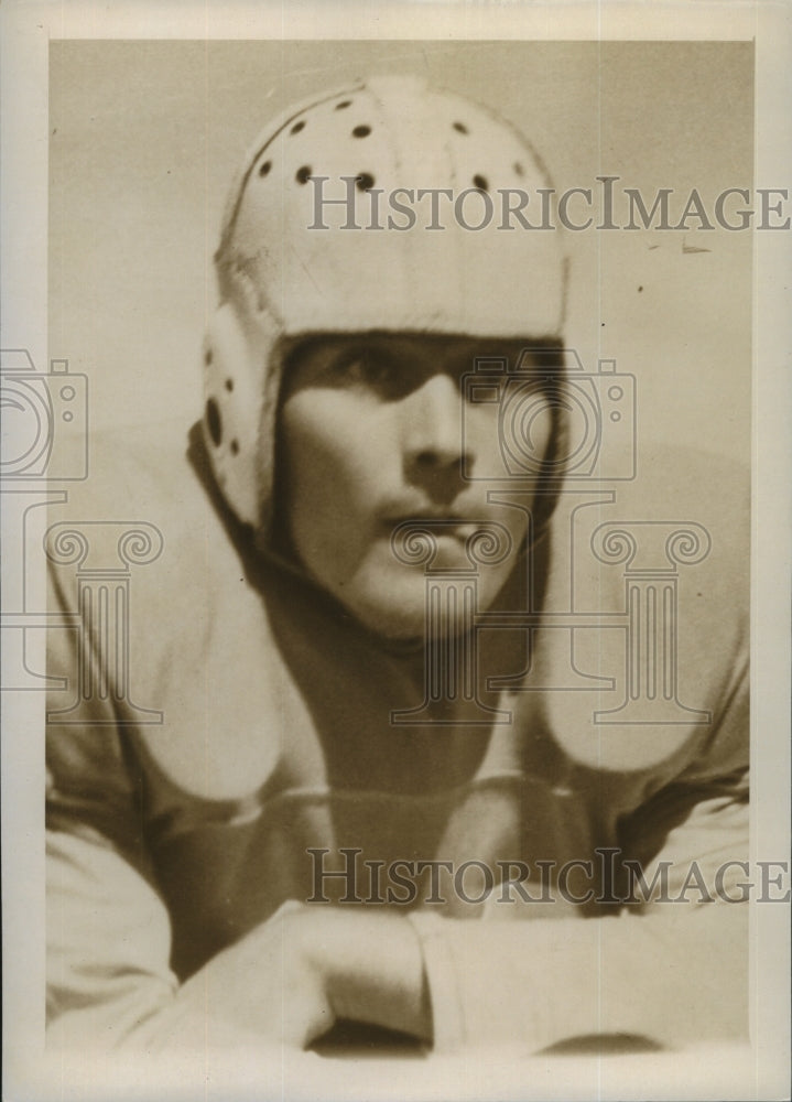 Football player R.B Patrick in action on the field - Historic Images