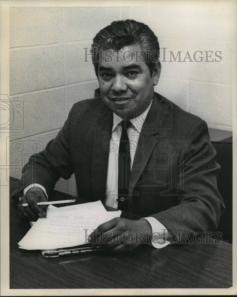 1969 Press Photo Principal Maige Rodriguez checks student list at Memorial High-Historic Images