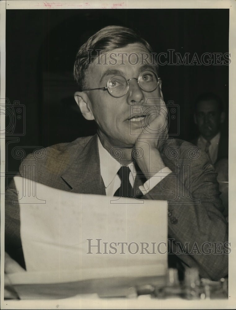 1946 Press Photo Dr James B Conant reading some papers - sba17778-Historic Images