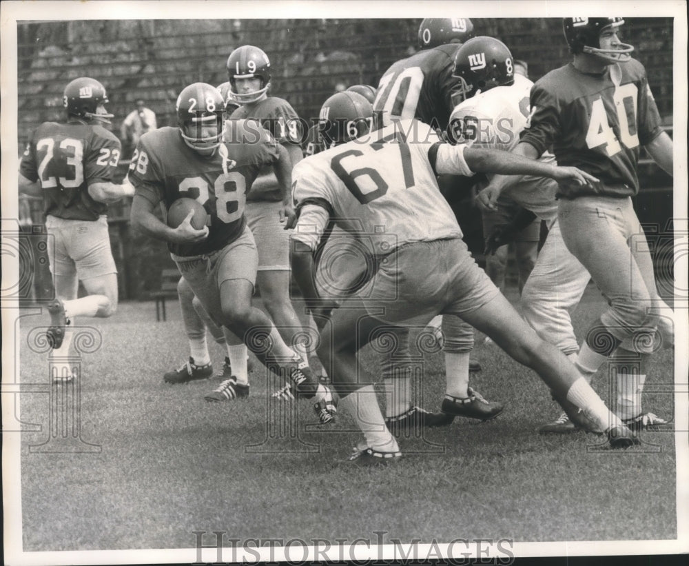 1971 Bob Duhon of Giants Takes Ball, Ron Hornsby Tries to Block Him - Historic Images
