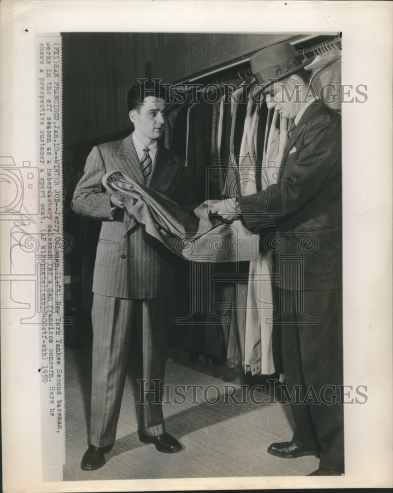 1950 Press Photo Jerry Colsman showing a sport coat to a costumer - sba22752-Historic Images