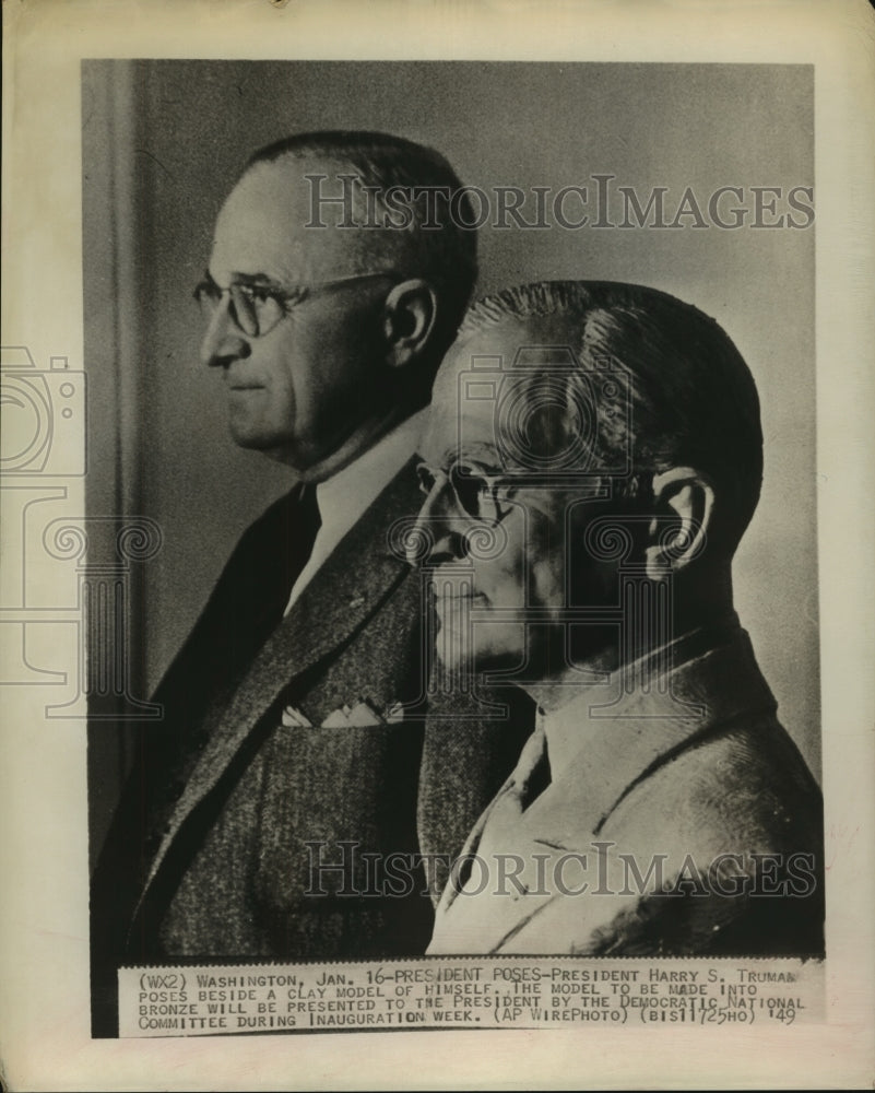 1949 Pres. Harry S. Truman poses beside a clay model of himself - Historic Images