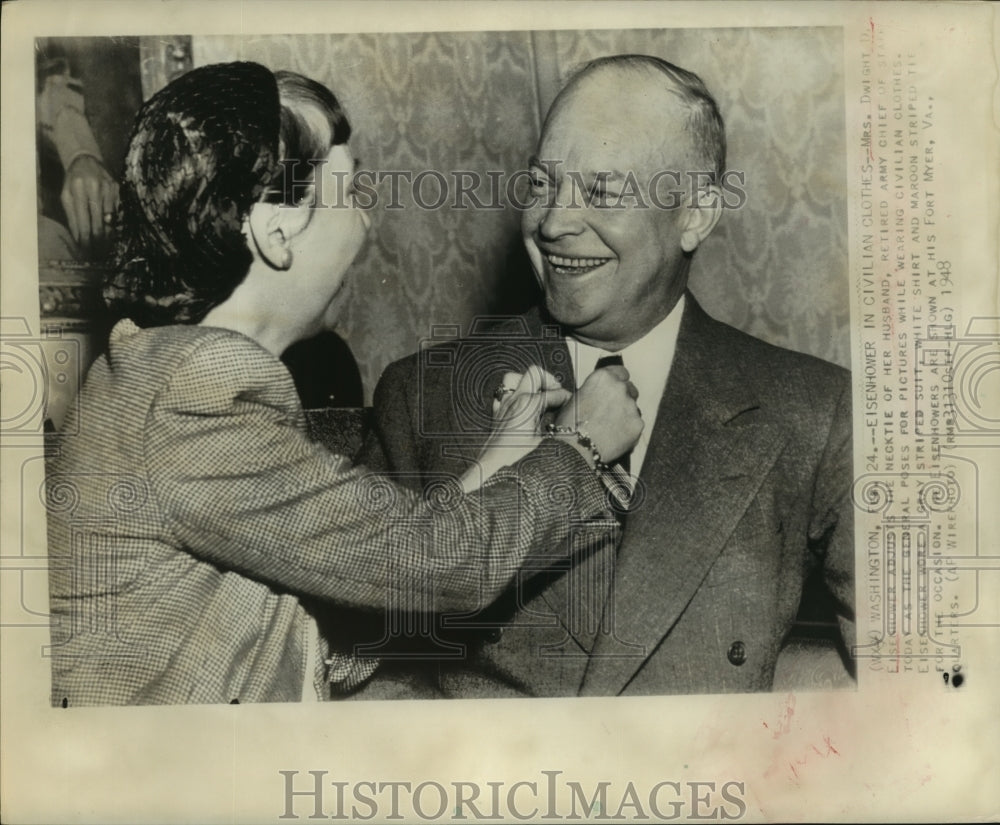 1948 Dwight Eisenhower shown in civilian clothes with his wife - Historic Images