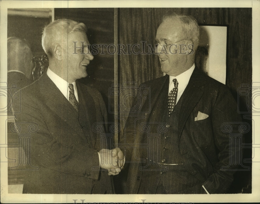 1935 Press Photo J. C. Williams congratulates E.T. Weir for winning NRA victory- Historic Images