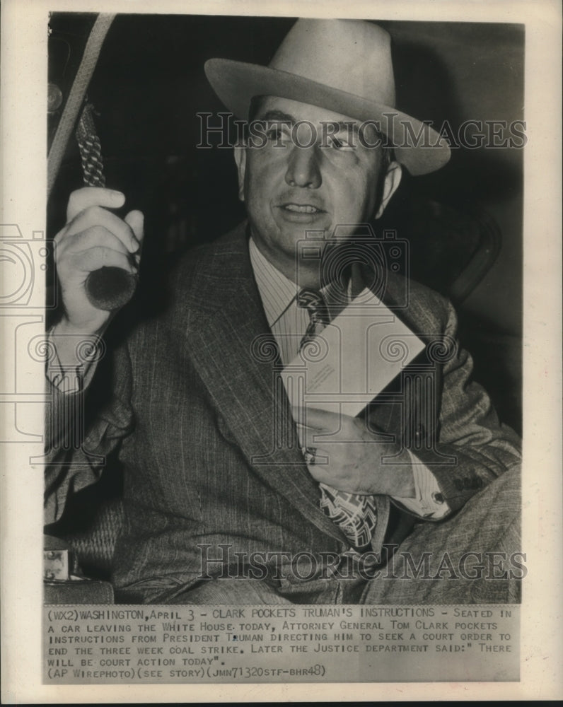 1948 Press Photo Attorney General Tom Clark pockets an order from Truman-Historic Images