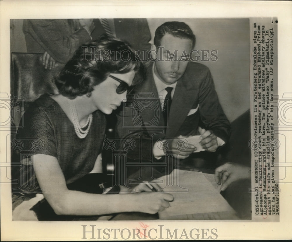 1960 Press Photo Princess Ira Hobenlobe signs agreement with Prince Alphonse-Historic Images