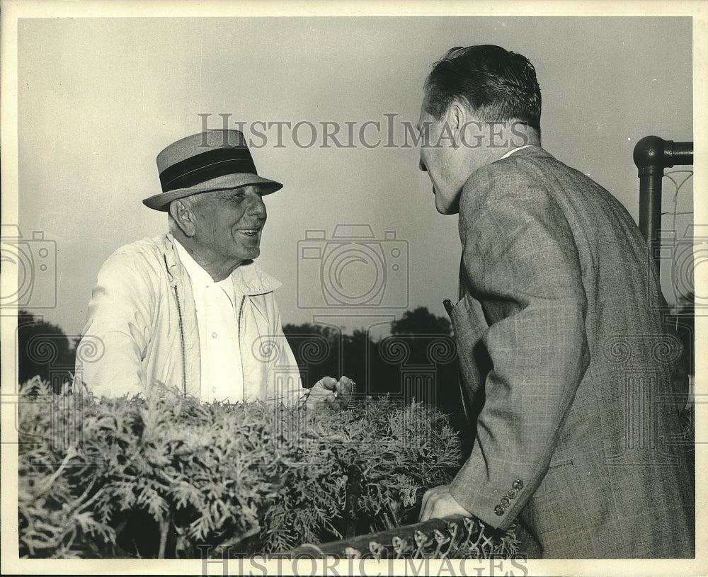 Press Photo Trainer Max Hirsch chats with Governor Rockefeller at Saratoga-Historic Images