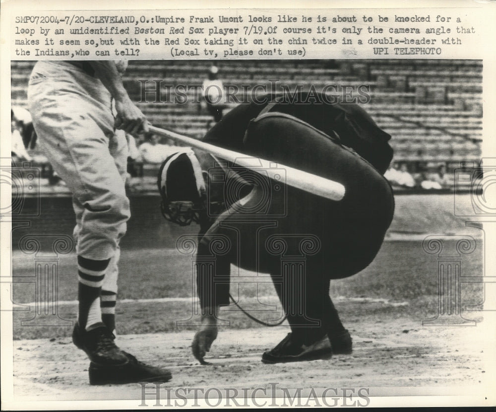 Press Photo Umpire Fran Umont as Red Sox player swings the bat - sba28523-Historic Images