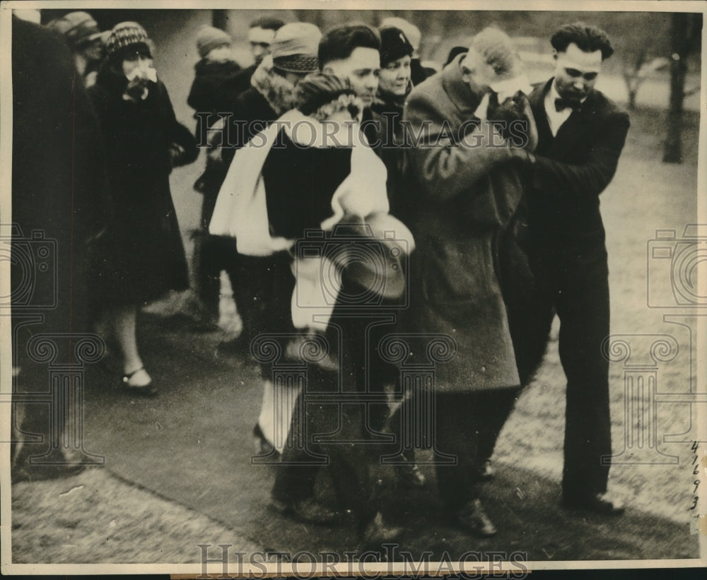 1928 Father of Slain Schneider Girl Assisted After Funeral - Historic Images