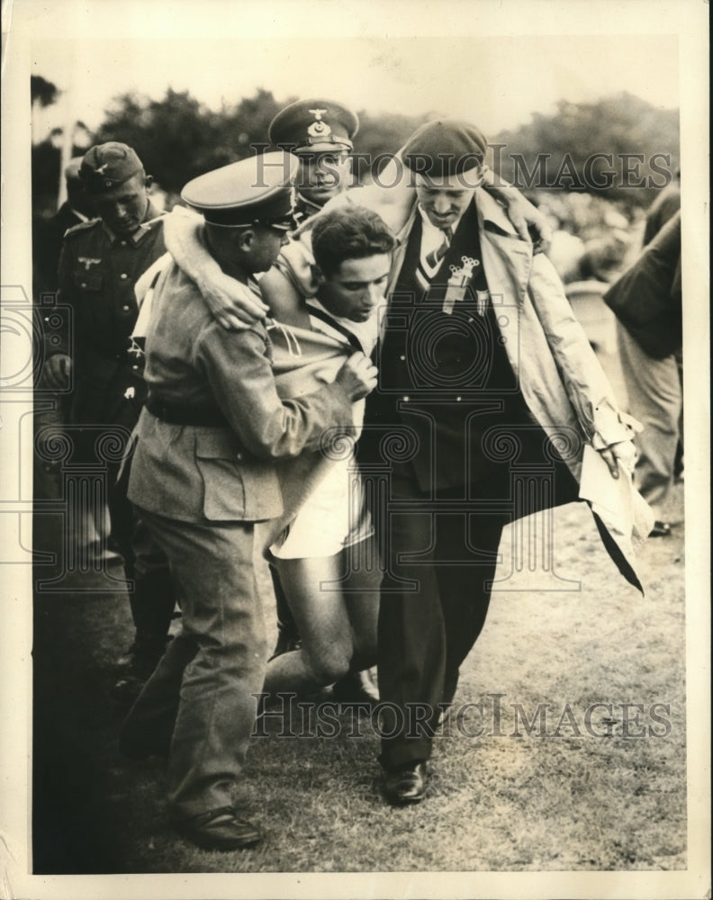 1936 Press Photo C.F. Leonard finished 2nd in Pentathon Competition Collapsed - Historic Images