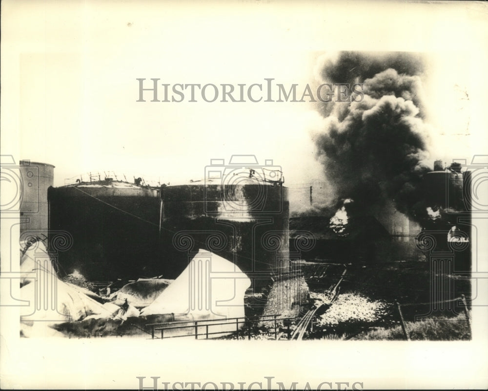 1940 Press Photo gasoline supplies on fire after German air raid, western front - Historic Images