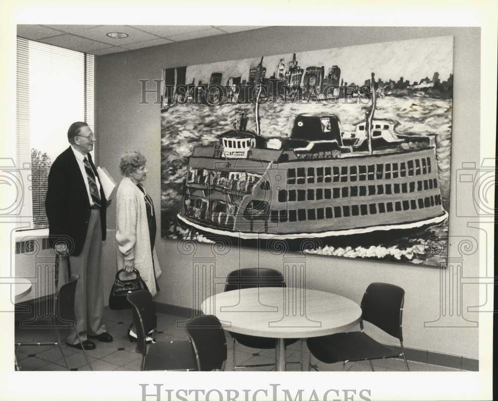 1990 Press Photo The Rev. Jones and Mrs. Tremblay look at ferry boat painting - Historic Images