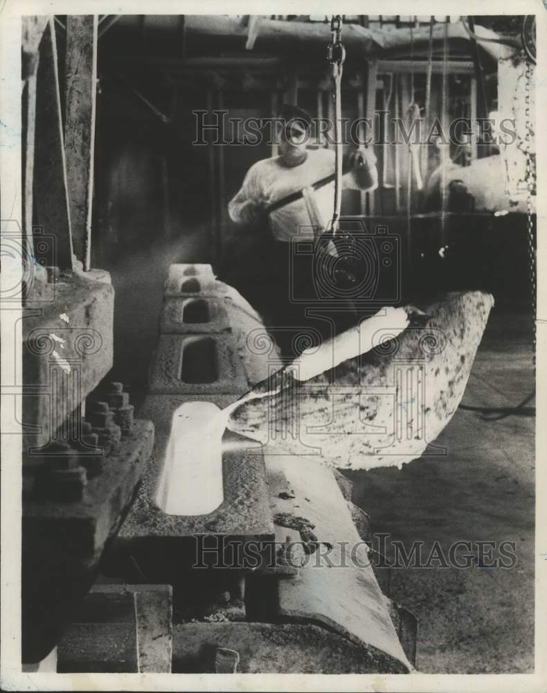 1958 Arthur Malone with liquid copper at Nassau Smelting-Historic Images