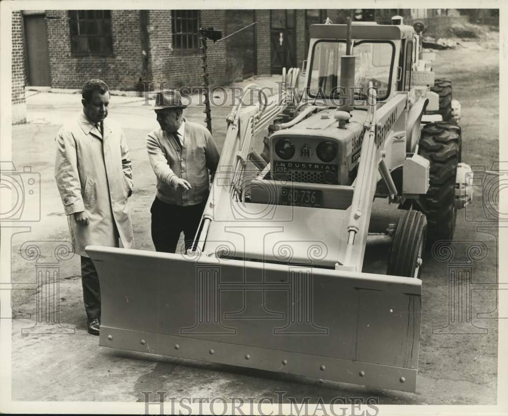 1967 Transportation officials discuss a new plow-Historic Images