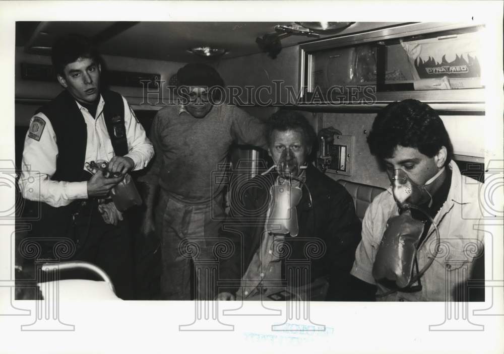 1991 American Legion Ferryboat fire victims treated by a medic - Historic Images