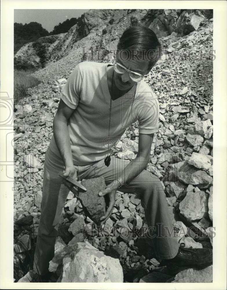 1990 Geologist Steven Okulewicz takes some rock samples-Historic Images