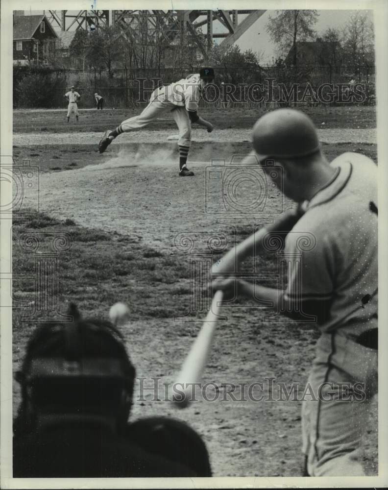 1967 Press Photo A batter swings at a pitcher&#39;s throw during a baseball game - Historic Images