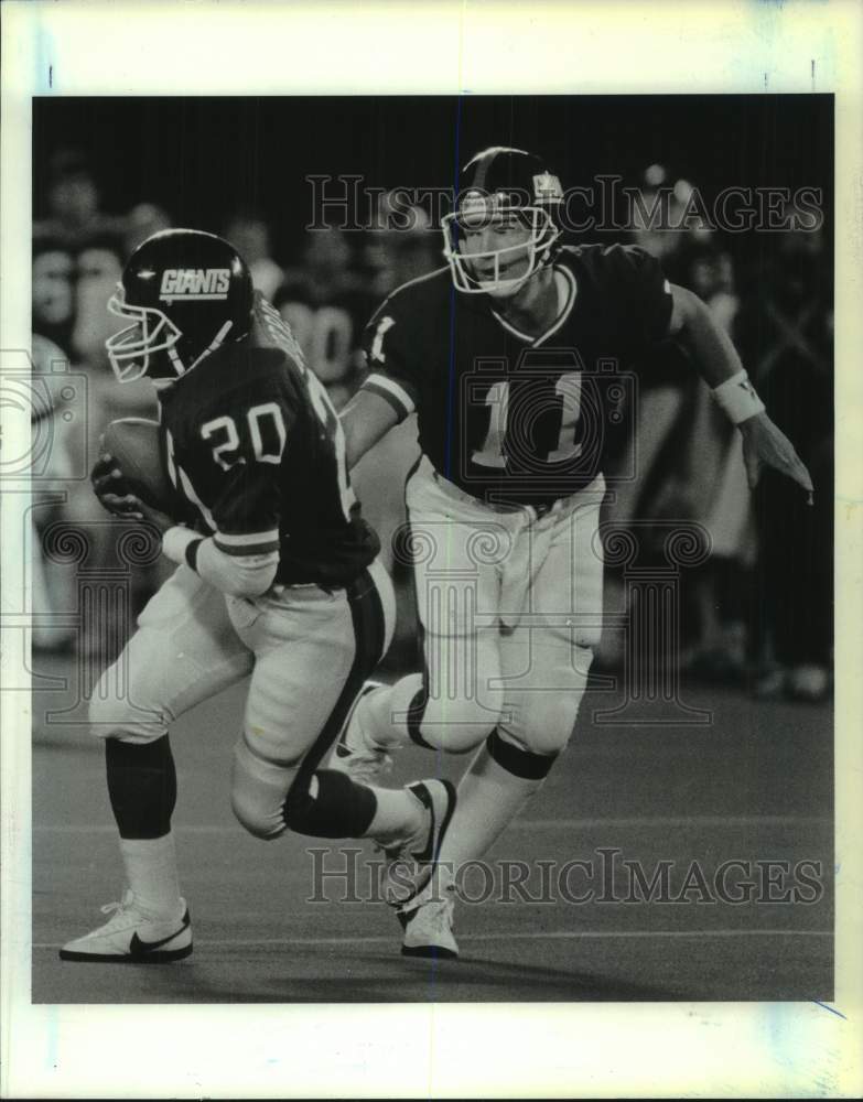 1989 Press Photo New York Giants football players Joe Morris and Phil Simms- Historic Images