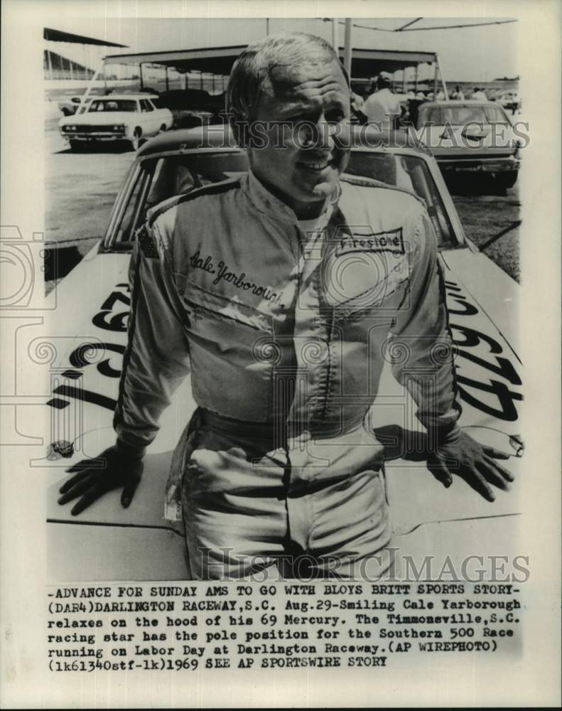 1969 Press Photo Cale Yarborough, Race Car Driver, Resting on '69 Mercury Hood- Historic Images