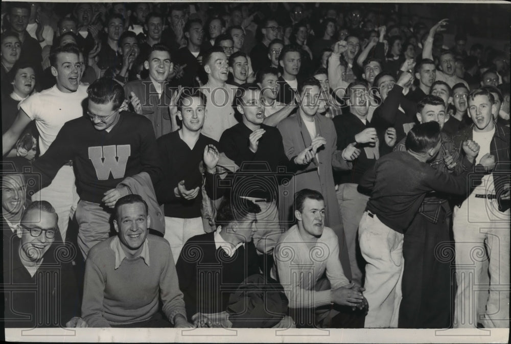 1951 Washington State College fans cheer for the Cougars during game - Historic Images