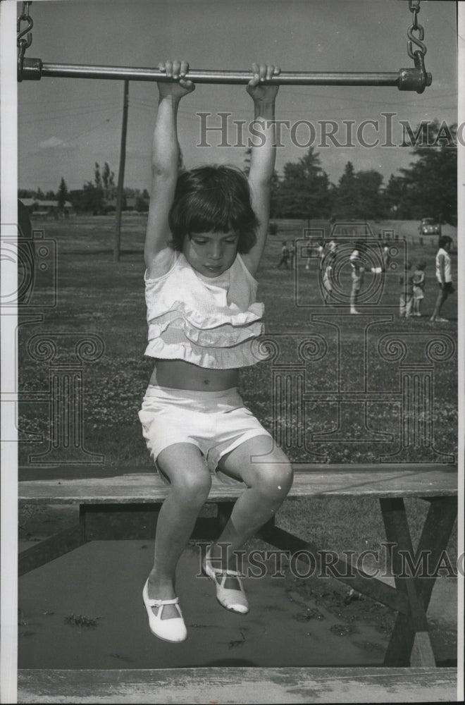 1967 Christina Gmoez tries a trapeze at Franklin  - Historic Images