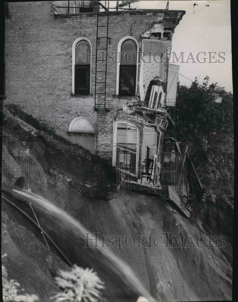1957 Disaster hits Montvale Apt as water comes out of a broken sewer Historic Images