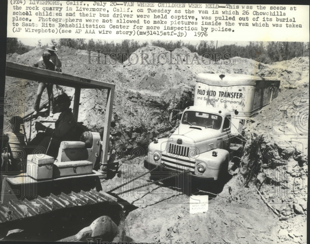 1976 Chowchilla school bus being dragged out of it's burial site-Historic Images