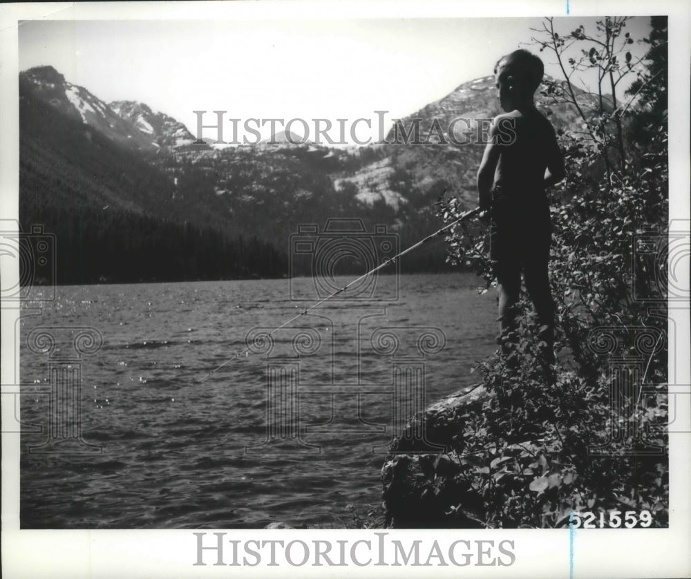 1971 Press Photo Young fisherman at Crystal Lake in the Mission Mountains - Historic Images