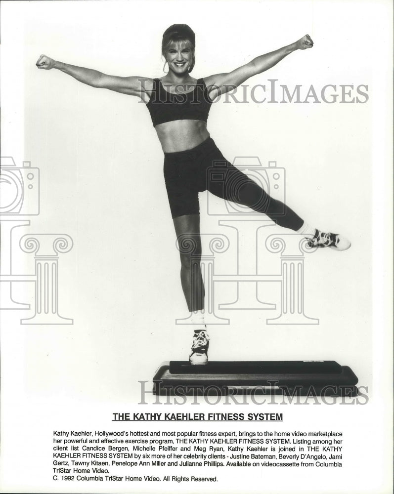 1992 Press Photo Kathy Kaehler demonstrates a stair stepper for her home video - Historic Images