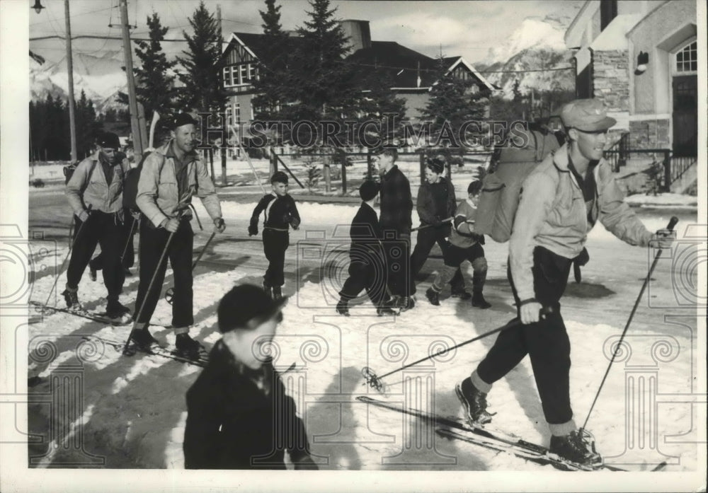 1940 Press Photo Don and Bill McCrae, Jim McDonald-skiers arrive in Banff-Historic Images