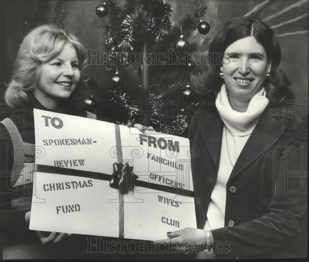 1978 Mary Beth Moran and Judy Williams donate to Christmas fund