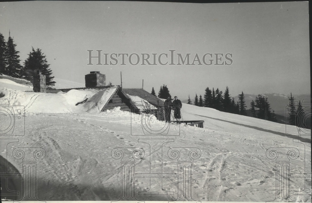 1937 Skiers next to snow buried house, Mount Spokane - Historic Images