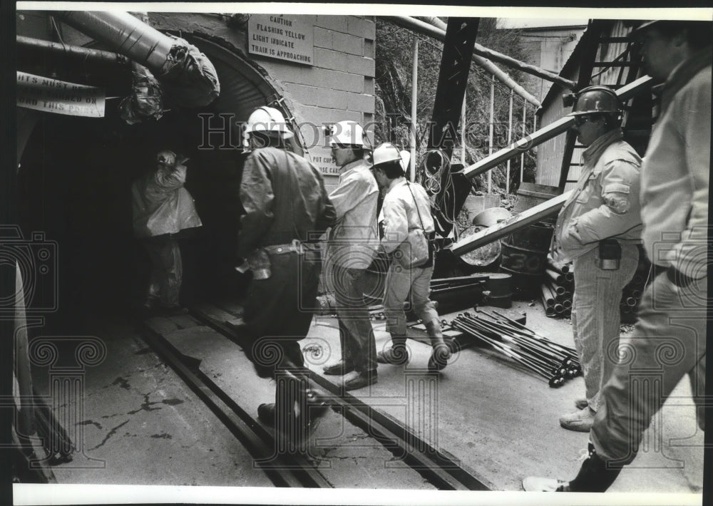 1991 Geologist Joe Luchin leads tour of Galena Mine, Osburn, Idaho