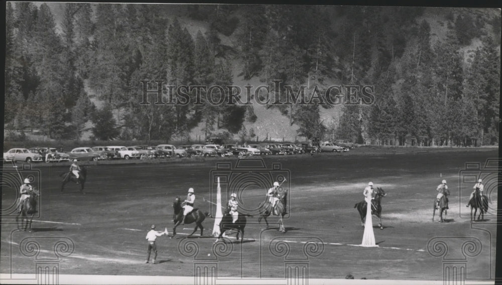 1953 Polo game, mountains and parking lot in background - Historic Images